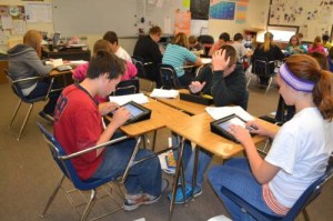 Students learning with tablets