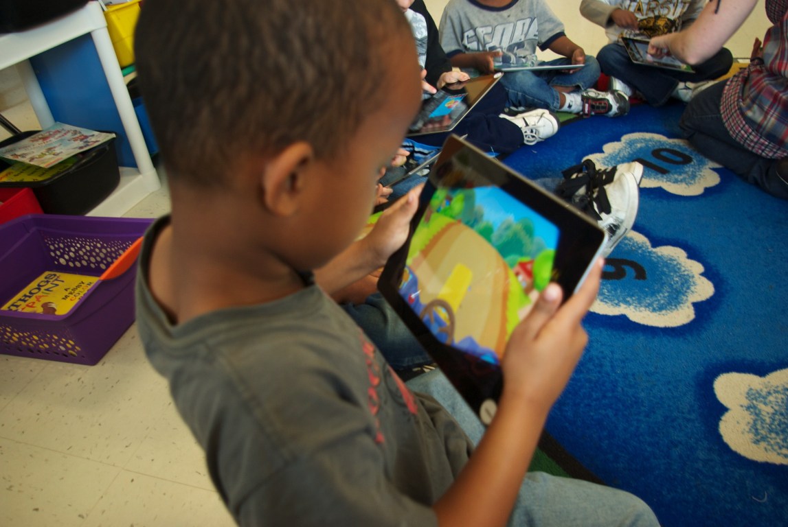 Auburn Kindergartener with his iPad
